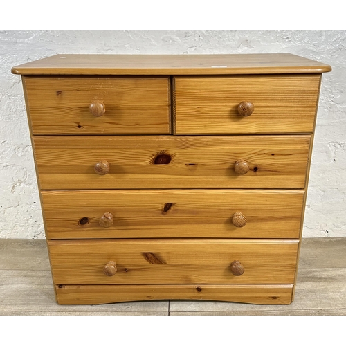 83 - A modern pine chest of drawers - approx. 74cm high x 80cm wide x 39cm deep