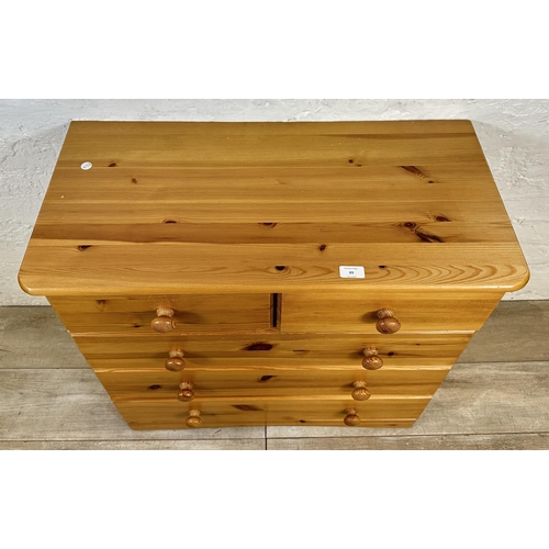 83 - A modern pine chest of drawers - approx. 74cm high x 80cm wide x 39cm deep