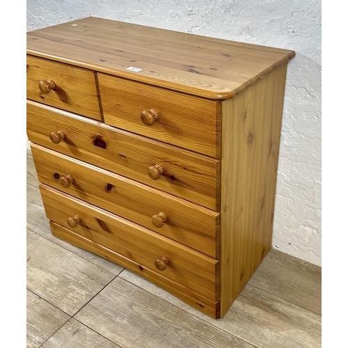 83 - A modern pine chest of drawers - approx. 74cm high x 80cm wide x 39cm deep