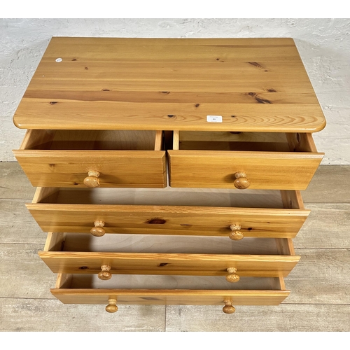 83 - A modern pine chest of drawers - approx. 74cm high x 80cm wide x 39cm deep