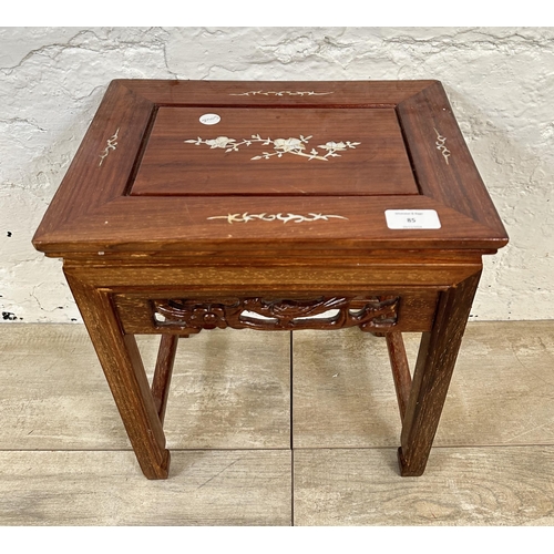 85 - A Chinese mother of pearl inlaid carved hardwood side table - approx. 39cm high x 34cm wide x 25cm d... 