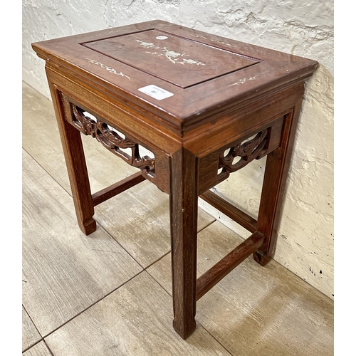 85 - A Chinese mother of pearl inlaid carved hardwood side table - approx. 39cm high x 34cm wide x 25cm d... 