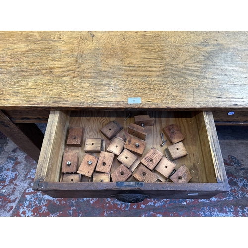 90 - An early 20th century solid oak farmhouse dining table - approx. 75cm high x 105cm wide x 213cm long