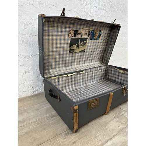 91 - Two mid 20th century items, one blue painted beech banded travel trunk and one cased Lumaplak Super ... 