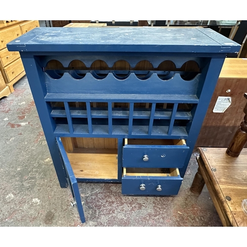 98 - A modern blue painted pine bottle rack cabinet - approx. 104cm high x 97cm wide x 37cm deep