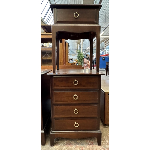 99 - Two pieces of Stag Minstrel mahogany furniture, one bedside table and one bedside chest of drawers -... 