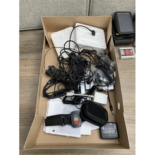 770 - A collection of items to include TomTom 4EN52 satnav, Mitsubishi MF2-HD microdiscs, Casio FP-12S min... 