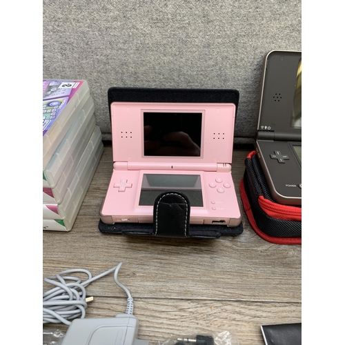 772 - Two cased Nintendo handheld game consoles, one DS XL with charger and one DS Lite with accessories a... 