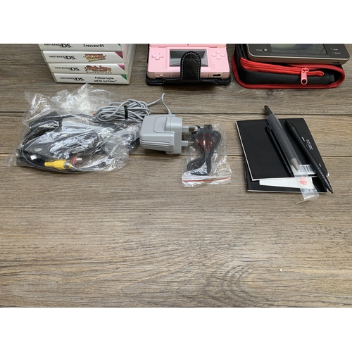 772 - Two cased Nintendo handheld game consoles, one DS XL with charger and one DS Lite with accessories a... 