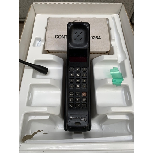 775 - A boxed Motorola 8800X Cellular phone