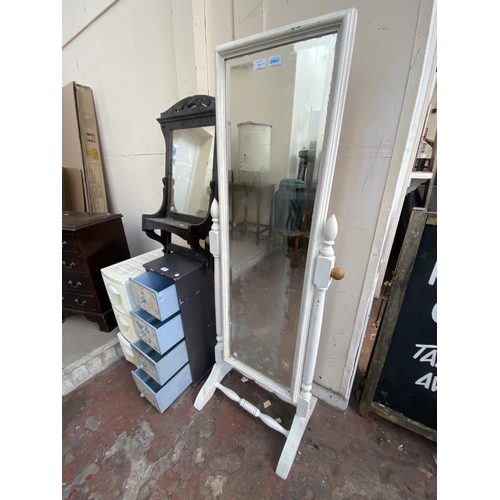 210 - Four items, one white painted pine framed 
bevelled edge cheval mirror, one Edwardian ebonised frame... 