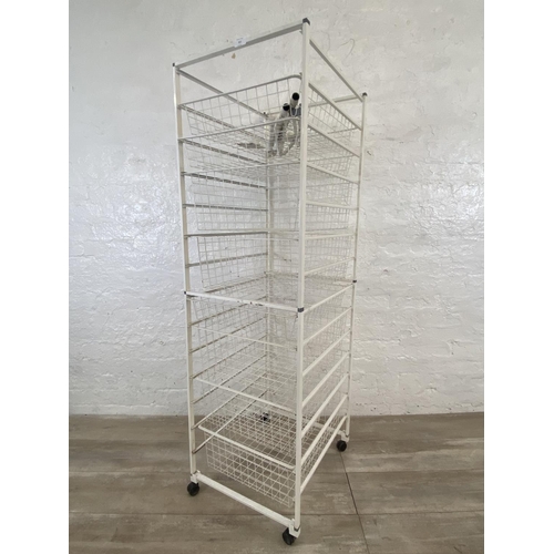 213 - An Elfa white metal eight tier shelving unit with baskets - approx. 150cm high x 53cm wide x 45cm de... 