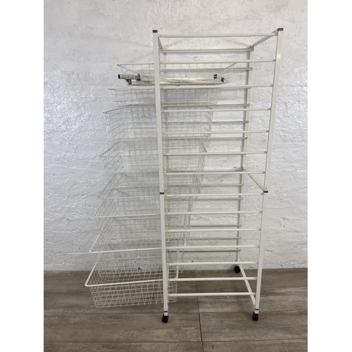 213 - An Elfa white metal eight tier shelving unit with baskets - approx. 150cm high x 53cm wide x 45cm de... 