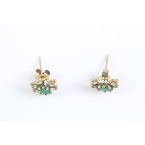 2002 - A pair of 9ct gold emerald and CZ floral cluster earrings - approx. gross weight 1.2g