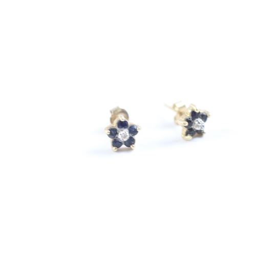 2003 - A pair of 9ct gold diamond and sapphire cluster stud earrings - approx. gross weight 0.7g