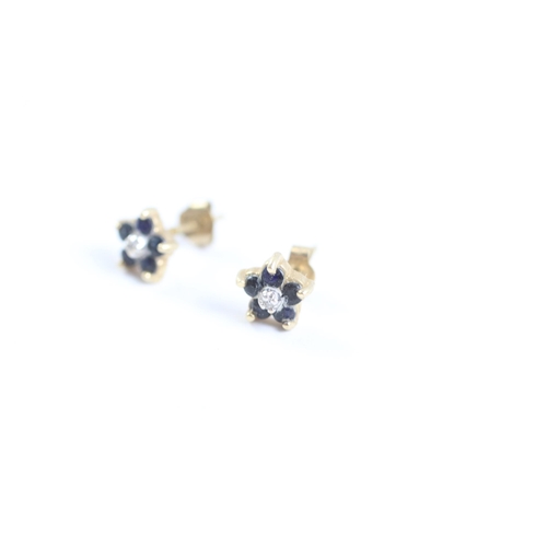 2003 - A pair of 9ct gold diamond and sapphire cluster stud earrings - approx. gross weight 0.7g