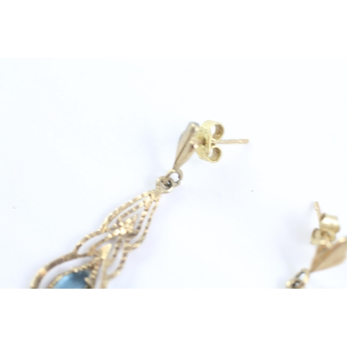 2004 - A pair of 9ct gold topaz drop earrings - approx. gross weight 1.6g