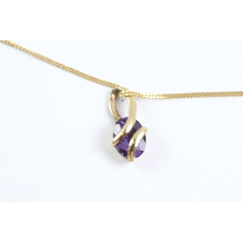 2005 - A 9ct gold amethyst pendant and chain - approx. gross weight 2.1g