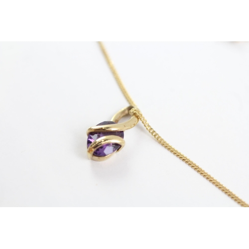 2005 - A 9ct gold amethyst pendant and chain - approx. gross weight 2.1g