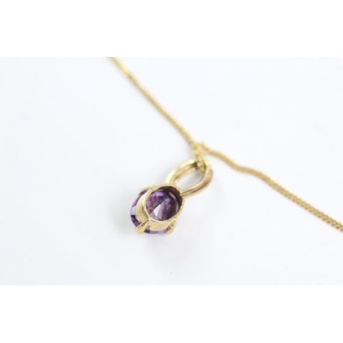 2005 - A 9ct gold amethyst pendant and chain - approx. gross weight 2.1g