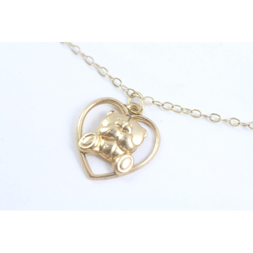 2010 - A 9ct gold forever friends bear pendant and chain - approx. gross weight 1.1g