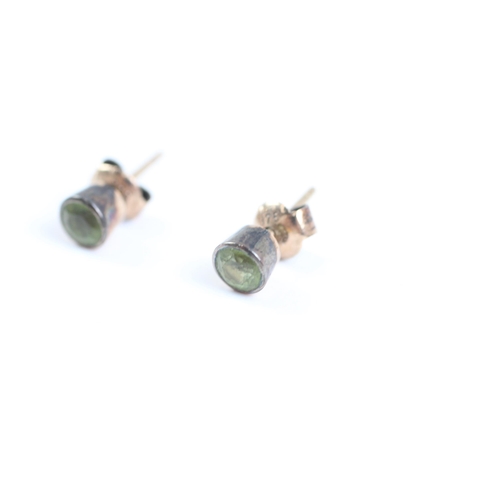 2011 - A pair of 9ct gold peridot stud earrings - approx. gross weight 1.3g