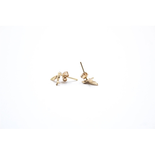 2013 - A pair of 9ct gold hummingbird stud earrings - approx. gross weight 0.4g