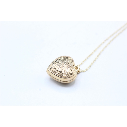 2018 - A 9ct gold heart design locket and chain - approx. gross weight 1.9g