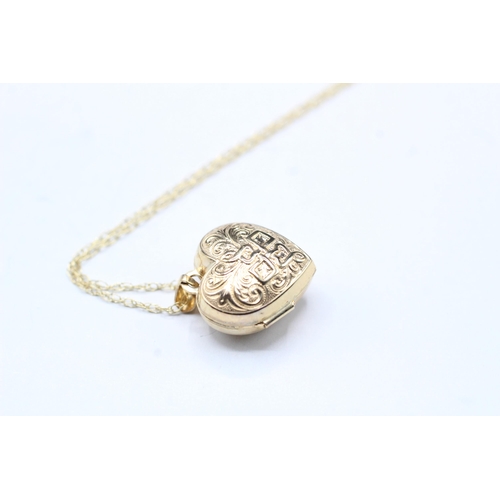 2018 - A 9ct gold heart design locket and chain - approx. gross weight 1.9g