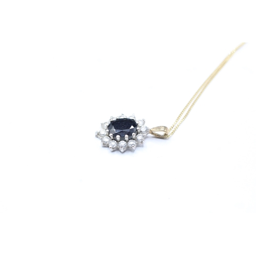 2020 - A 9ct gold sapphire and CZ cluster pendant and chain - approx. gross weight 2.3g