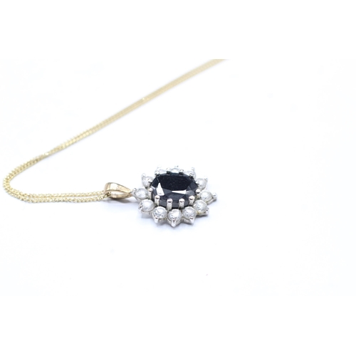 2020 - A 9ct gold sapphire and CZ cluster pendant and chain - approx. gross weight 2.3g