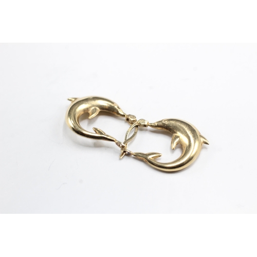 2021 - A pair of 9ct gold dolphin design hoop earrings - approx. gross weight 1.3g