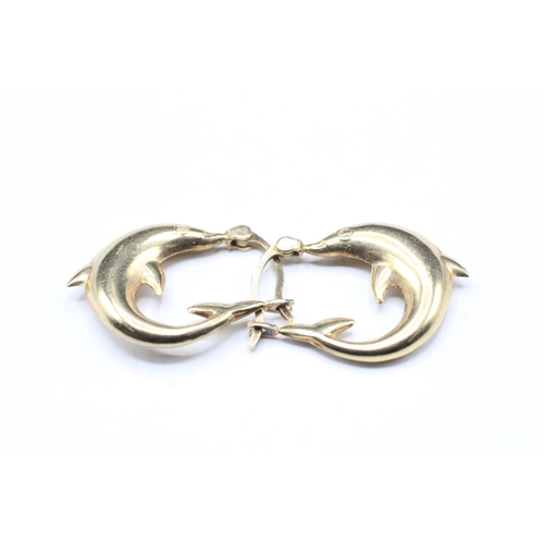 2021 - A pair of 9ct gold dolphin design hoop earrings - approx. gross weight 1.3g