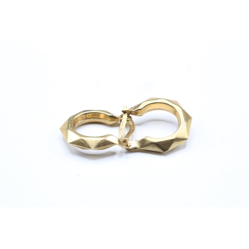 2023 - A pair of 9ct gold hoop earrings - approx. gross weight 1.3g