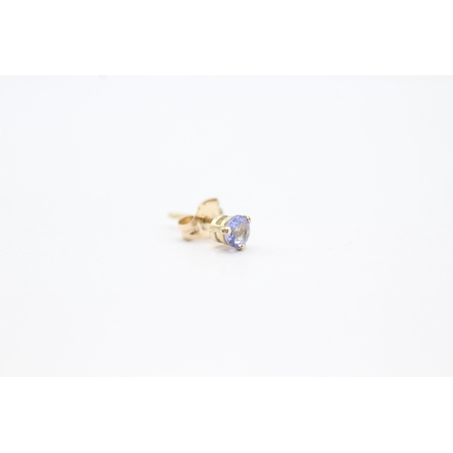 2030 - A pair of 9ct gold tanzanite single stone stud earrings - approx. gross weight 0.3g