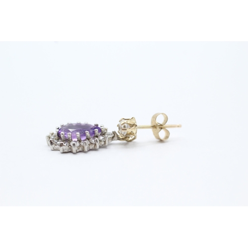 2031 - A pair of 9ct gold amethyst and CZ earrings - approx. gross weight  1.9g