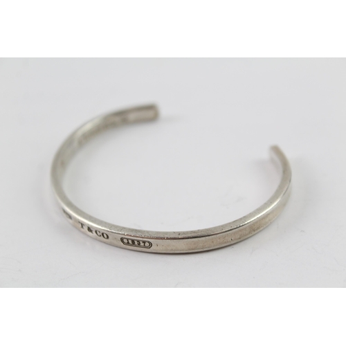 2032 - A Tiffany & Co sterling silver concave torque bangle - approx. gross weight 19g