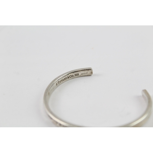 2032 - A Tiffany & Co sterling silver concave torque bangle - approx. gross weight 19g