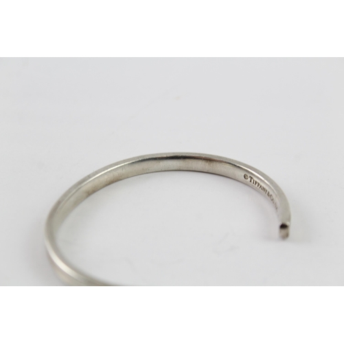 2032 - A Tiffany & Co sterling silver concave torque bangle - approx. gross weight 19g