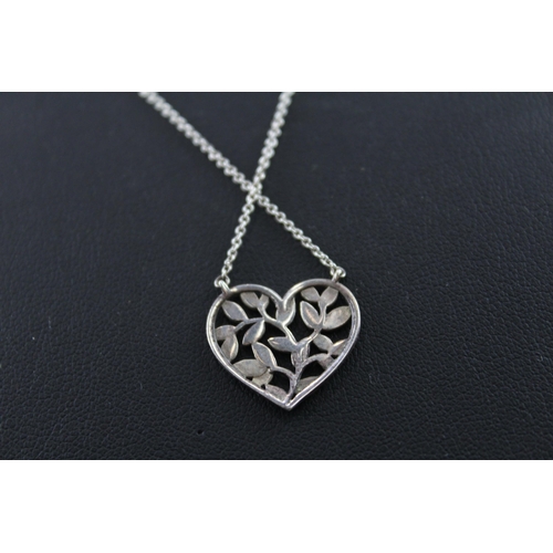 2049 - A Tiffany & Co sterling silver foliate heart pendant necklace with pouch - approx. gross weight 2g