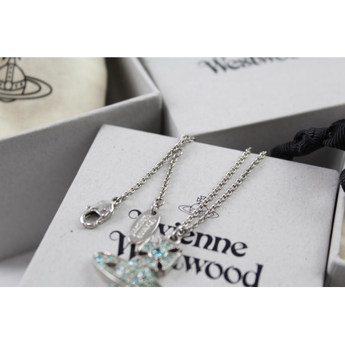 2056 - Two boxed pieces of Vivienne Westwood silver tone orb jewellery, one bracelet and one pendant neckla... 