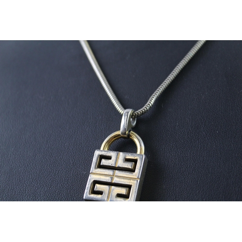 2059 - A Givenchy gold tone padlock logo pendant necklace