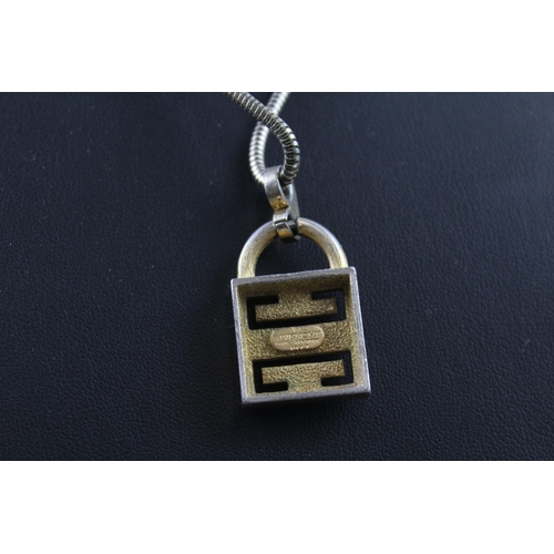 2059 - A Givenchy gold tone padlock logo pendant necklace