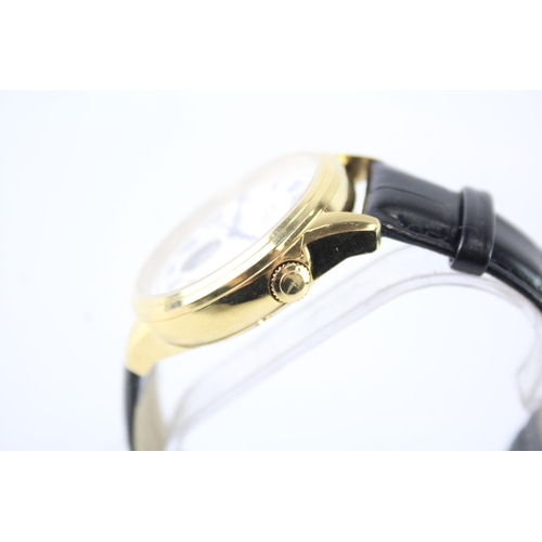 2106 - A Rotary automatic gold tone men's wristwatch