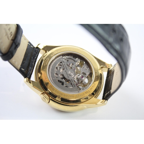 2106 - A Rotary automatic gold tone men's wristwatch