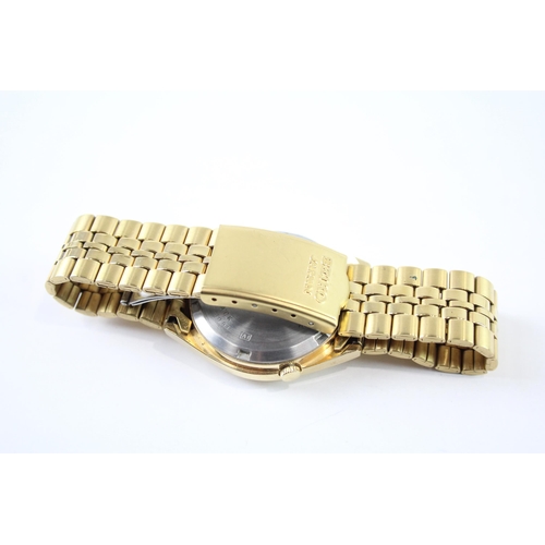 2110 - A Seiko 5 automatic gold tone men's wristwatch