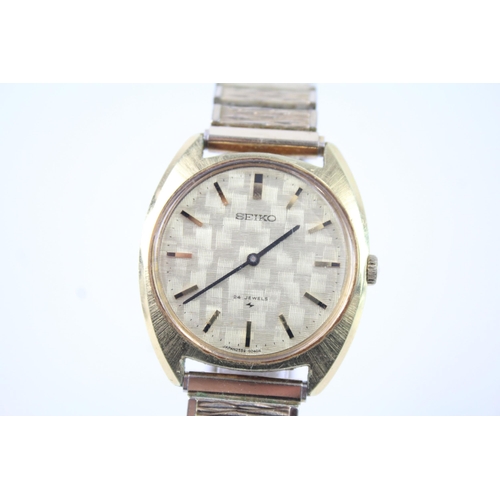 2111 - A Seiko chequerboard dial hand wind men's wristwatch - ref no. 2559-0060