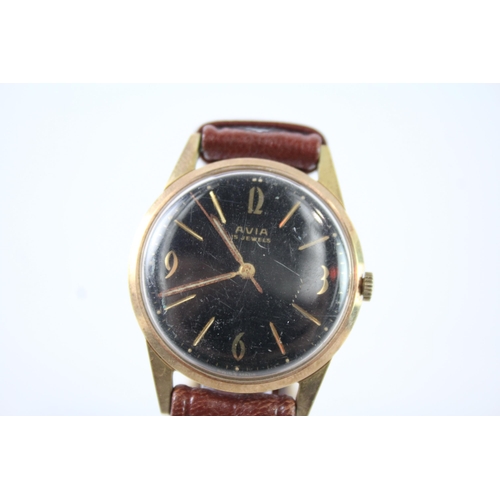 2123 - An Avia gold tone hand wind men's wristwatch