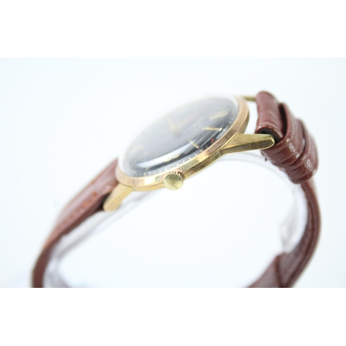 2123 - An Avia gold tone hand wind men's wristwatch