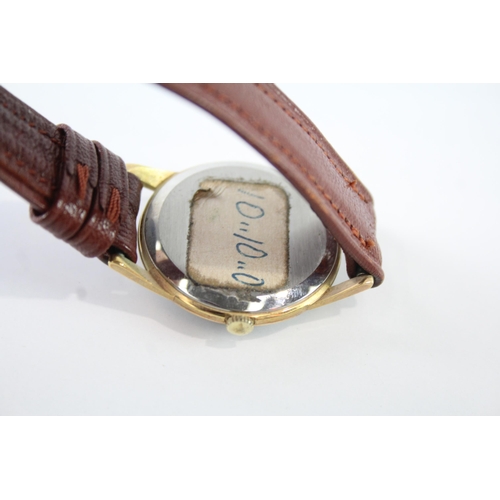 2123 - An Avia gold tone hand wind men's wristwatch